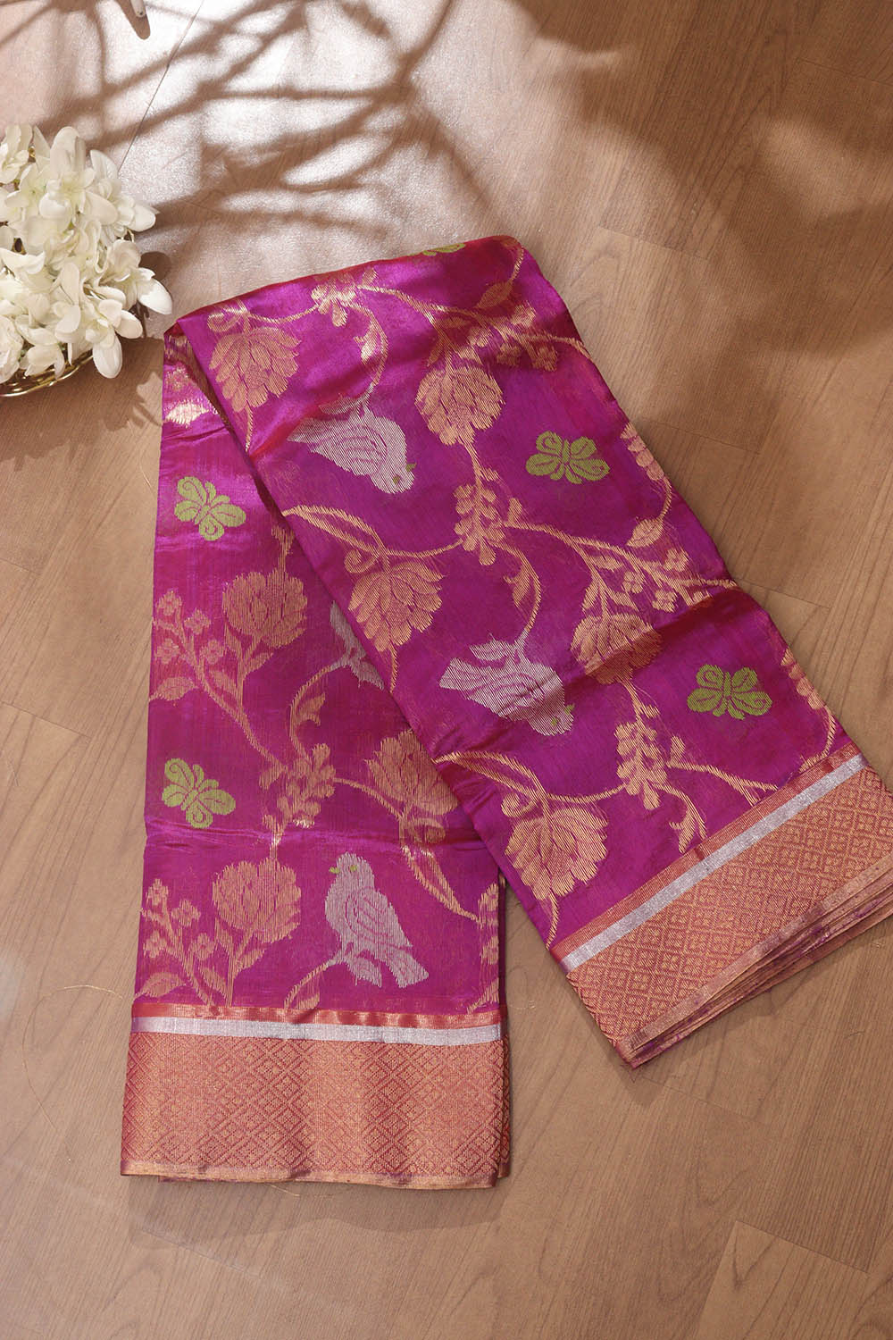 Grey jacquard kancheepuram tissue silk saree,contrast intricate pallu &  border of thilakam mokku,poun,chakram & mayil