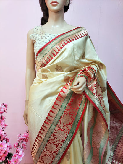 Cream Handloom Banarasi Pure Katan Silk Saree With Red Contrast Border - Luxurion World