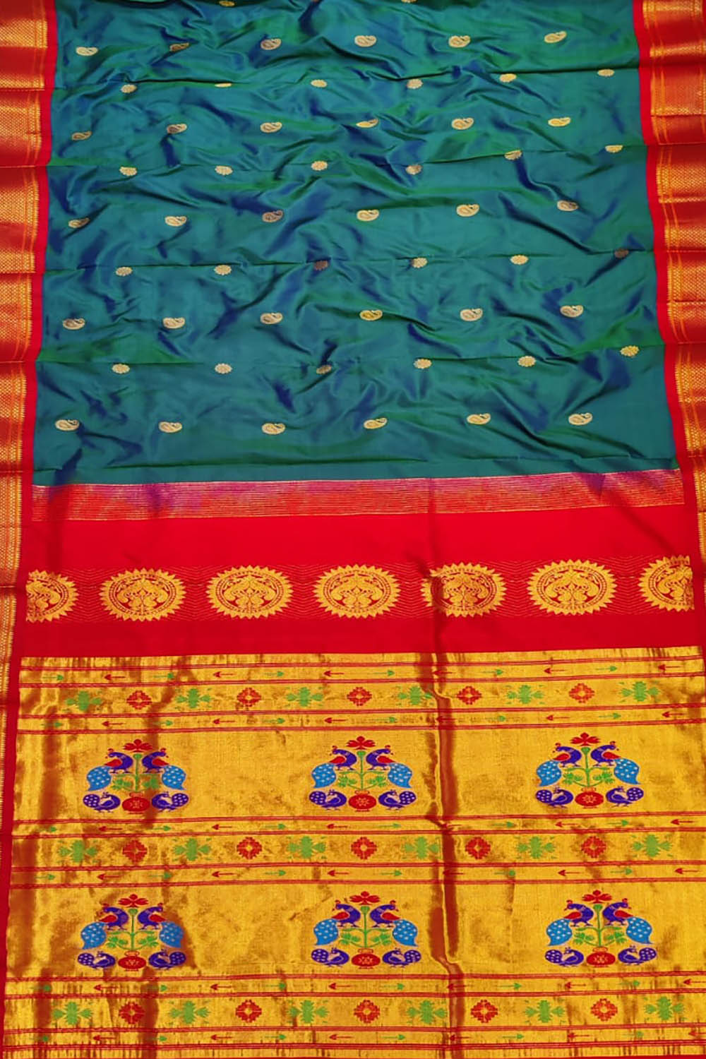 Paithani pure silk saree in peacock green with floral motifs all over